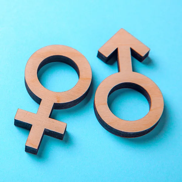 Male and female chromosome symbols laying next to each other